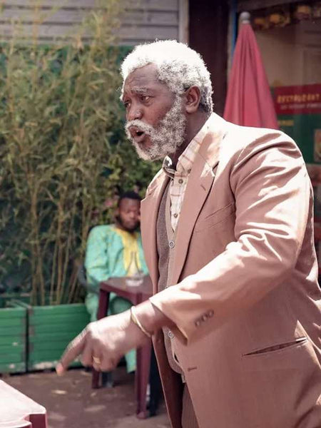 Issaka Sawadogo In His Shadow Suit