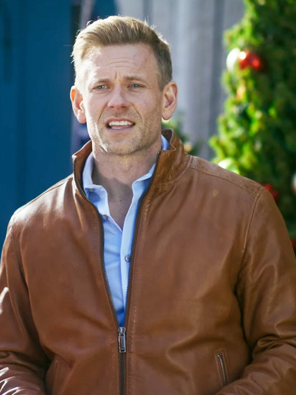 A Christmas Less Traveled 2024 Eric Johnson Brown Jacket