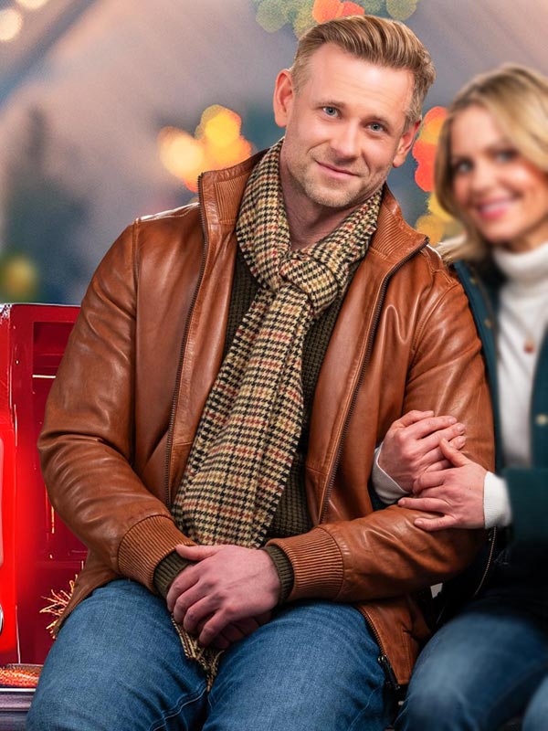 A Christmas Less Traveled 2024 Eric Johnson Brown Jacket