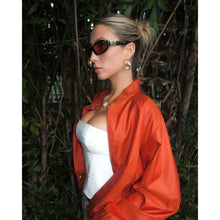 Alix Earle’s Orange Jacket