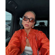 Alix Earle’s Orange Jacket